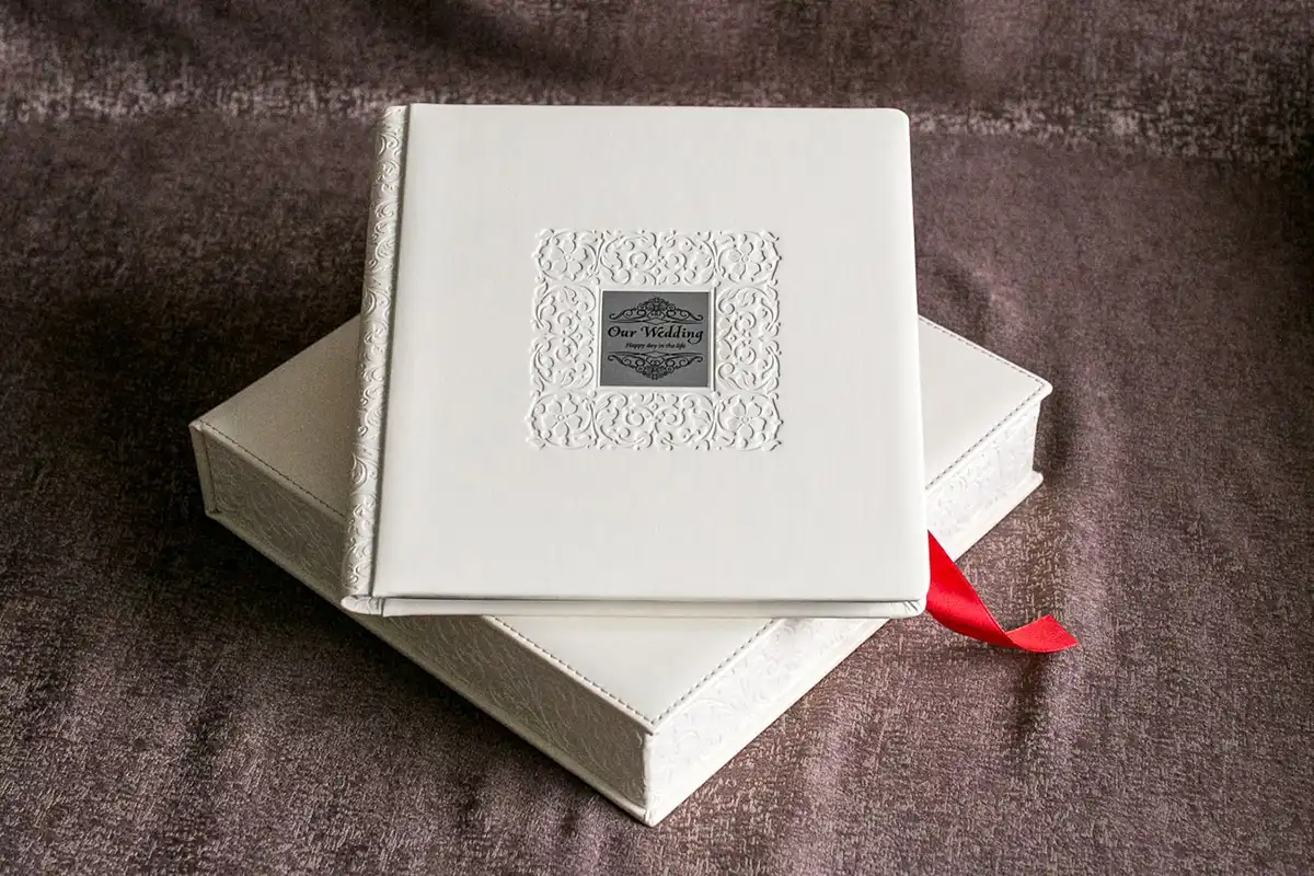 Професійна весільна фотокнига преміум якості у Львові, виготовлення авторських фотоальбомів від RoStudio.