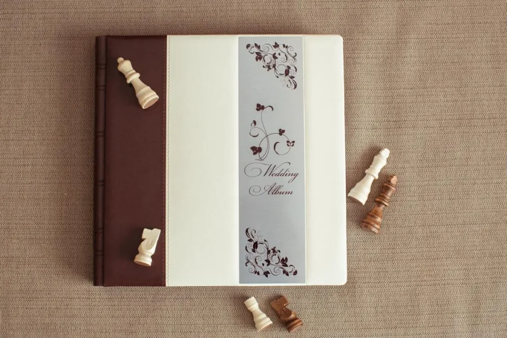 весільна фотокнига з натуральної шкіри Львів, замовити дизайн фотоальбому, професійний фотограф на весілля ціна, якісний друк весільних книг RoStudio.