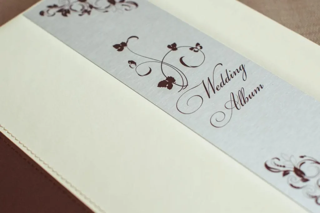 дизайн весільної фотокниги Львів, замовити весільний альбом, ціна послуги фотографа, професійна відеозйомка весілля, портфоліо RoStudio.