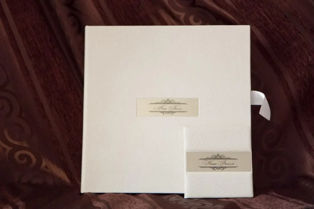 весільна фотокнига Львів ціна, замовити весільний альбом, послуги фотографа Львів ціна, професійна відеозйомка весілля, виготовлення фотокниг на замовлення.