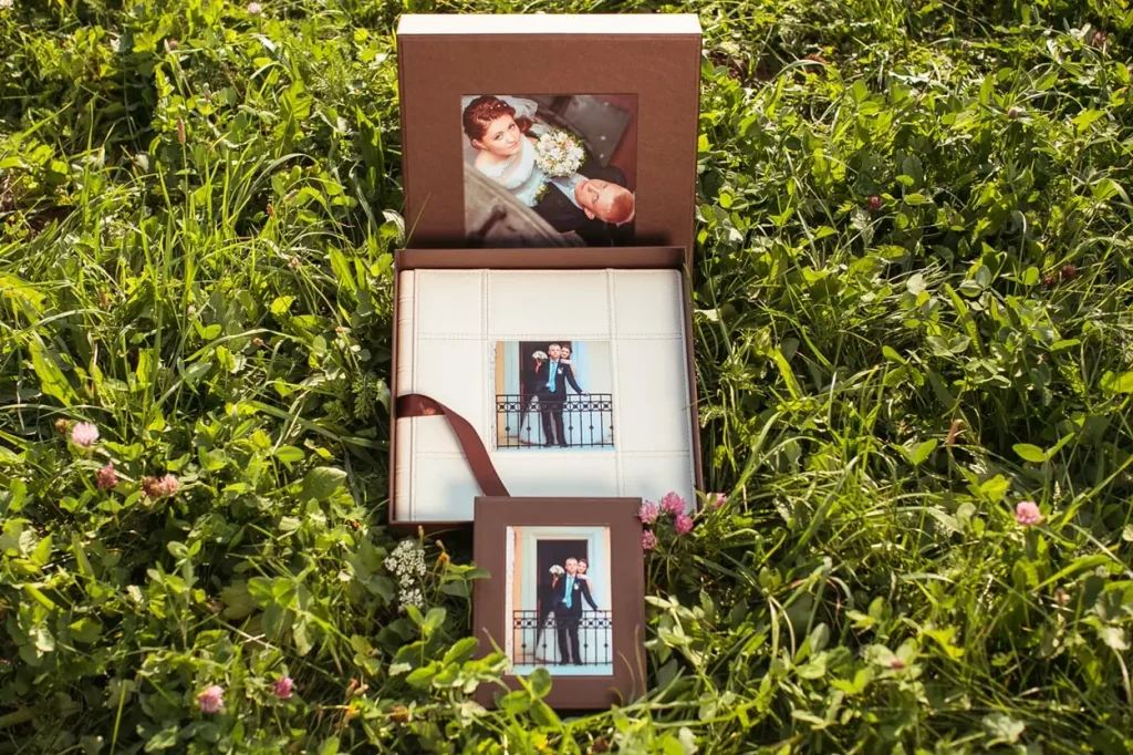 весільна фотокнига Львів ціна, замовити весільний альбом, послуги фотографа Львів ціна, професійна відеозйомка весілля, виготовлення фотокниг для батьків RoStudio.